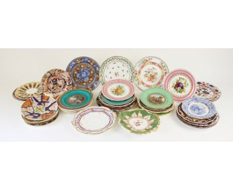 A large collection of British cabinet plates, dessert plates and entree plates, to include; Coalport, Derby, Bishop &amp; Sto