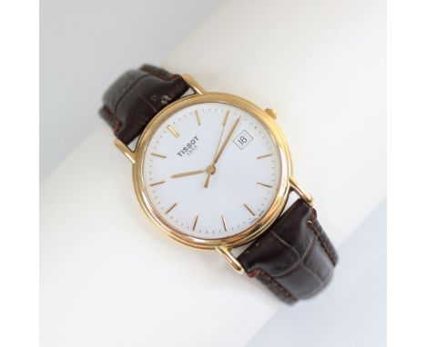 A gentleman's 18ct gold Tissot wristwatch, the round white dial with baton markers and date window to three 'o' clock, set to