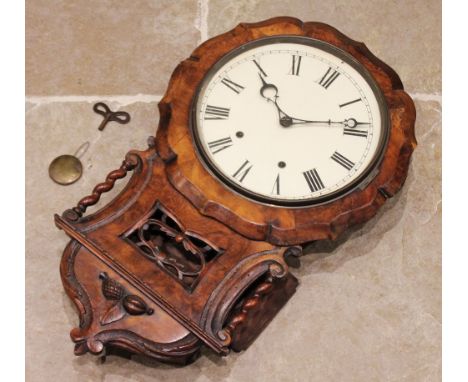 A Victorian figured walnut drop dial wall clock, the 30cm painted white dial applied with Roman numerals enclosing the two tr