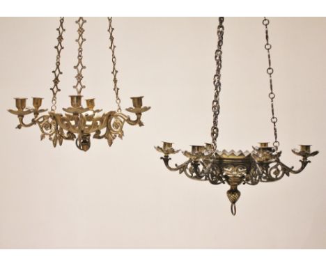 A near pair of gilt metal ecclesiastical chandeliers, 20th century, each with a pierced bowl applied with six cast foliate sc