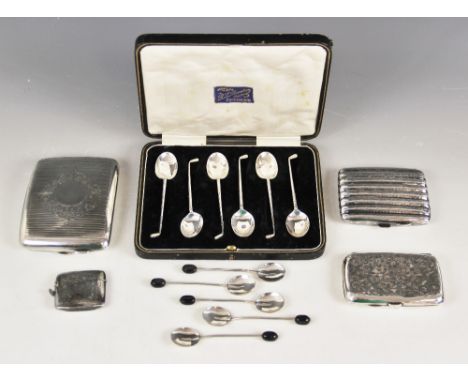 A set of six George V silver novelty silver teaspoons, Barker Brothers Silver Ltd, Birmingham 1933, each handle modelled as a