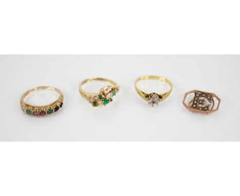 An 18ct gold illusion set diamond ring, ring size K 1/2, together with an emerald and diamond 9ct gold twist design ring, siz