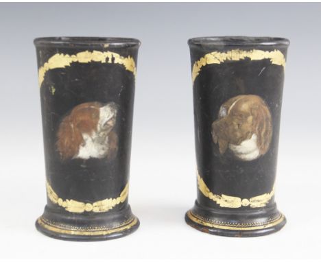 A pair of 19th century papier mache spill vases, of tapering form with a spreading foot, each with a painted portrait of a sp