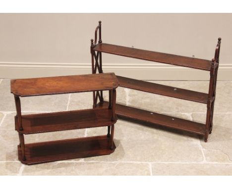 A 19th century mahogany wall shelf, the three shelfs united by ring turned uprights and lattice cross stretchers, 68cm H x 84