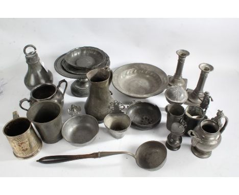Pewter to include pair of candlesticks, pedestal bowl, two porringers, ladle with turned wooden handle etc. (qty)
