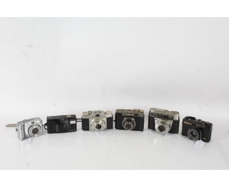 Six cameras and lenses to include a Cosmic 35 with a T-43 4/40 lens, Agfa camera with a Agfa 1:3.5/45 lens, a Kodak Retina IF