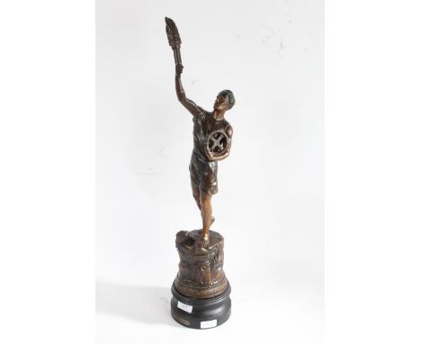 20th century French spelter figure depriving a man with tools holding a torch set on a black painted wooden base entitled L'I