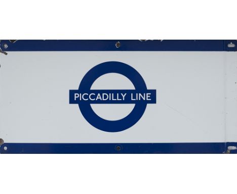 London Underground enamel frieze sign PICCADILLY LINE. In good condition with minor edge chipping, measures 20in x 9.75in.