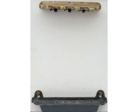 GWR wall mounted Umbrella Stand with cast iron drip tray with GWR cast into front and brass umbrella holder stamped on the fr