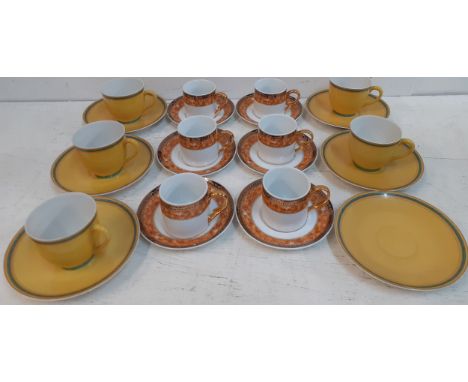 Hermes-Six 'Toucans Yellow' mustard yellow saucers and 5 matching porcelain coffee cups together with another set of 6 coffee