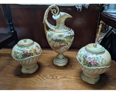 A Victorian Royal Worcester jug, ornate scrolled leaf handle, fern and woodland foliage decoration on a blush ivory ground, a