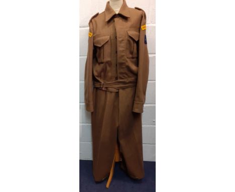 A vintage Royal Armoured corps uniform, 35" waist x 40" chest together with a trenching spade in holder, 2 army belts and 2 o