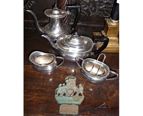 Four piece silver plated tea set and a "Widdecombe Fair" brass door knocker