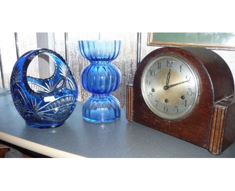 Two blue cut glass vases and a 1930s mantle clock