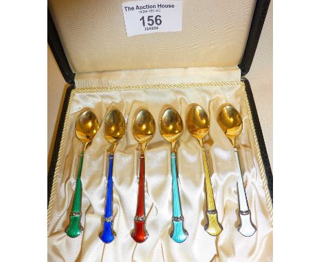 Cased set of six silver gilt coffee spoons with guilloche enamel decoration by Jacob Tostrup. Marked as J.T. STERLING, each a