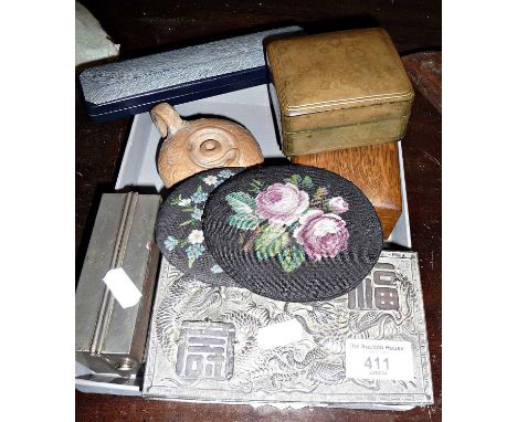 Boxes, buttons, embroidered pouches, pottery oil lamp