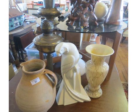 Verwood pottery pitcher, Art Deco St Clements china stylised parrot, brass oil lamp and a tall glass vase