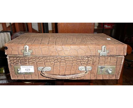 Vintage leather briefcase or stationery case containing football programmes and annuals