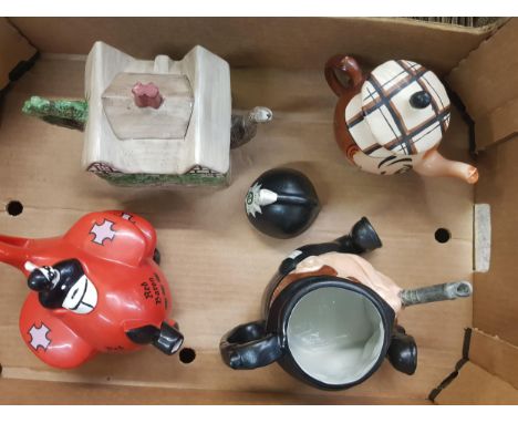 A collection of Novelty Tea pots to include Carlton ware Red Baron, Wade Tea Pot &amp; 2 Staffordshire fine ceramics tea pots