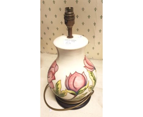 Moorcroft Pink Magnolia on cream ground large table lamp, 35cm in height overall. 