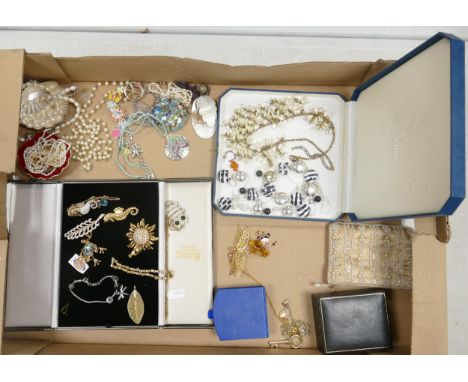 A large collection of Costume Jewellery to include pearl necklaces, brooches, pendants, sets etc 