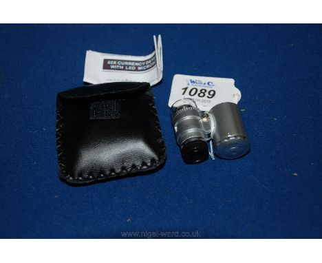 A Collector's Cased LED Illuminated 60X  Magnification Lens  & UV Lamp.