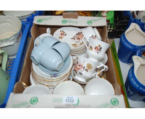 A part Royal Standard Teaset comprising four cups, six saucers, six tea plates, sugar bowl, milk jug, plus a six setting Engl