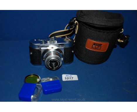 A Voigtlander Vito B 35 mm Camera with a Voigtlander Color-Skopar 55 mm f/2.5 Prontor SVS together with 3 filters and a padde