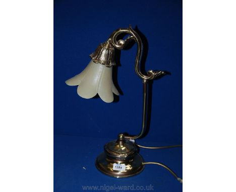 A glass desk Lamp with petal glass shade