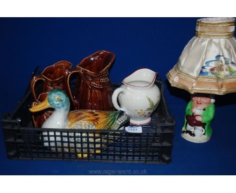 A quantity of china including three brown glazed jugs with wheat pattern, a Royal Winton Lark Rise Jug, character jug table l