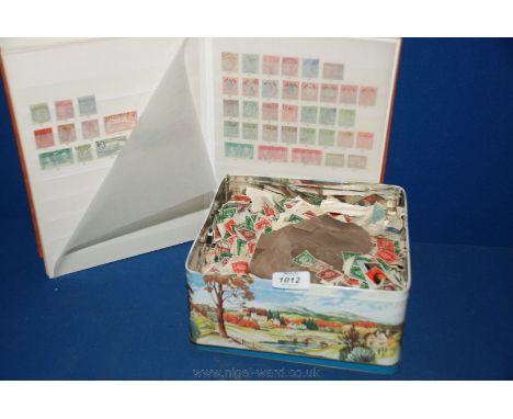 A Stamp Album full of Stamps together with a tin of loose Stamps