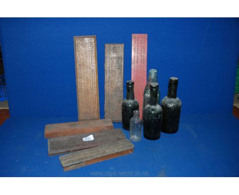 A quantity of old Bottles including George Thomas Tenby, A.E. Ley, Conway, etc. and six Cribbage Score Boards
