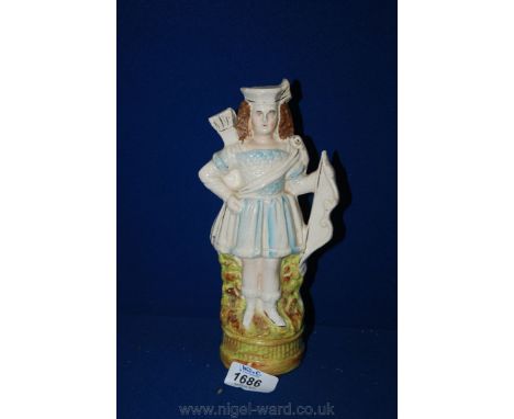 A small Staffordshire figure of a boy with a bow and arrow.