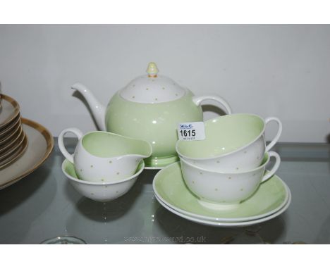 A Susie Cooper bone china Tea for Two in green and white and raised polka dot detail - spout a/f