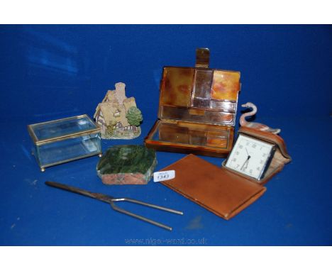 A glass casket, Sand Swan, leather cased Alarm Clock, Verdigris Ashtray etc.