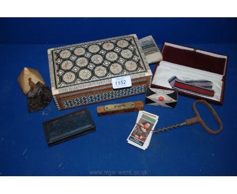 A quantity of miscellanea including Corkscrew, small Spirit Level, John Bond Marking Ink, Cigarette Cards, self-inking Stamp 