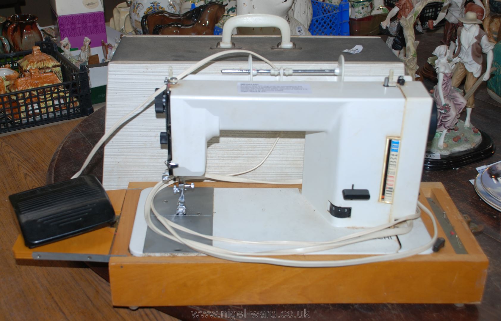 A cased electric Necchi type 565 Sewing Machine