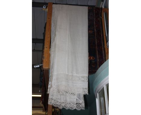 A pair of full length Edwardian Linen and Lace Curtains, 58'' wide x 120'' drop.