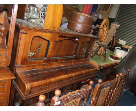 A good quality Art Nouveau Mahogany framed upright Piano with moulded top and three shaped panels to the front, and having th