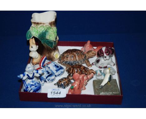 Three Wade turtles, pink Wade elephant, pair of small Delft dogs,  Delft lady, Hornsea Vase, etc.