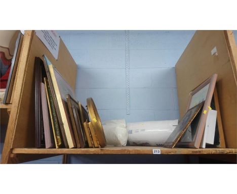 Shelf of prints, mirrors etc.