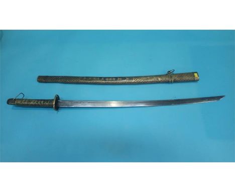 A Japanese sword in decorative bamboo lined brass scabbard, with brass grip