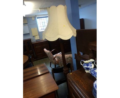An oak Lees type standard lamp