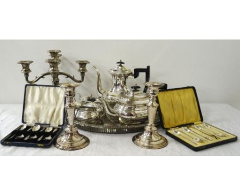 COLLECTION OF SILVER PLATED WARESincluding a four piece tea service, candelabra, pair of candlesticks, Walker & Hall oblong f