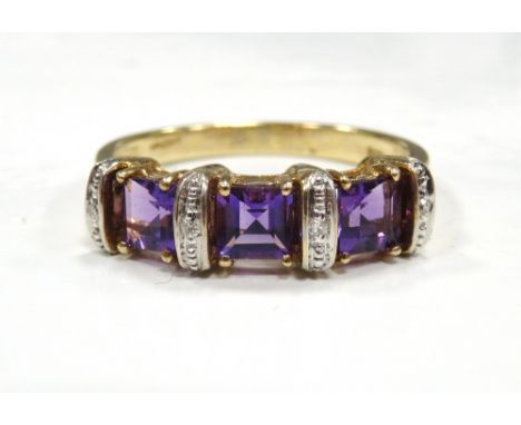 AMETHYST AND DIAMOND DRESS RINGthe three square cut amethysts separated with diamonds, on nine carat gold shank, ring size P