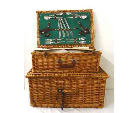 WICKER PICNIC HAMPERwith cutlery selection, containers, cups, saucers and plates, and a Thermos flask, and an empty wicker ha