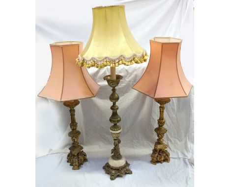 PAIR OF GILTWOOD TABLE LAMPS raised on triangular scroll feet, with knopped columns with pale pink hexagonal shades, 98.5cm h