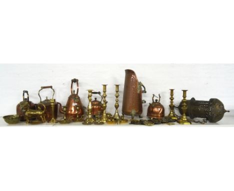 COLLECTION OF BRASS AND COPPER WARESincludes candle and chamber sticks, an Indian pierced ceiling light, kettles and horse br