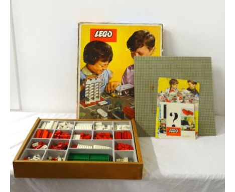 1960's 'LEGO 810' SETwith base and fold-out Town Plan board, a variety of building bricks, vehicles and accessories, colour l