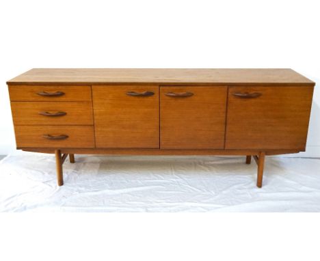 RETRO 1960s TEAK SIDEBOARDby 'Avalon', the central double door cupboard with shelf interior, flanked by three drawers to one 